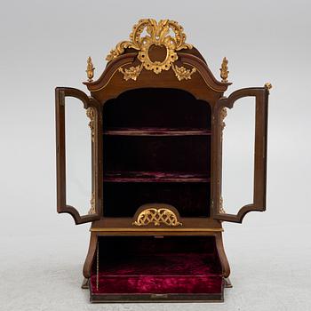 A Rococo style cabinet, late 19th century.