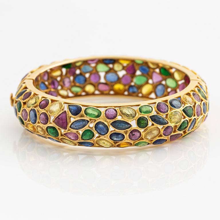 Bracelet, gold with multicolored gemstones.