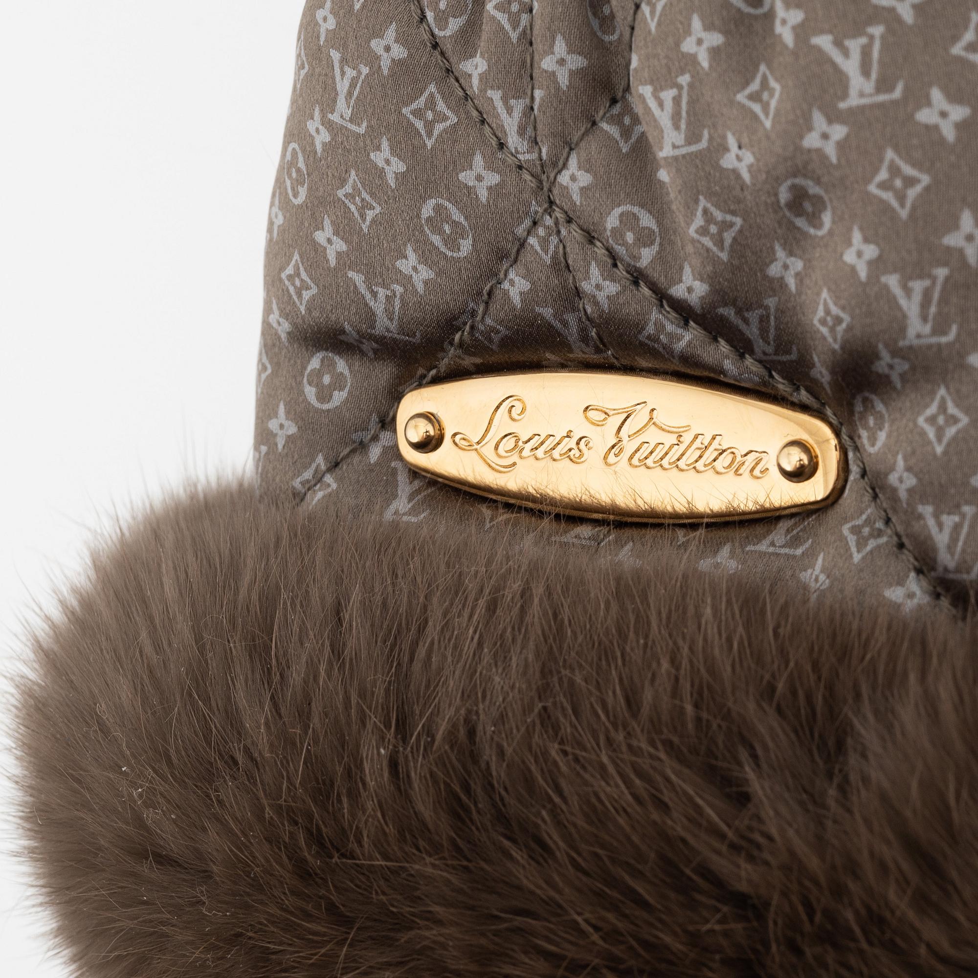 Louis Vuitton, a pair of silk and rabbit fur 'Moufles Igloo' mittens, 2009.
