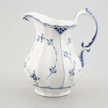 A 'Blue Fluted Half Lace' / 'Musselmalet' pitcher, Royal Copenhagen, model 667, 1898-1923.