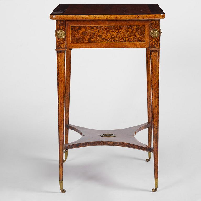 A Gustavian burr-parquetry and bilt brass-mounted table by A. Lundelius (master in Stockholm 1778-1823).