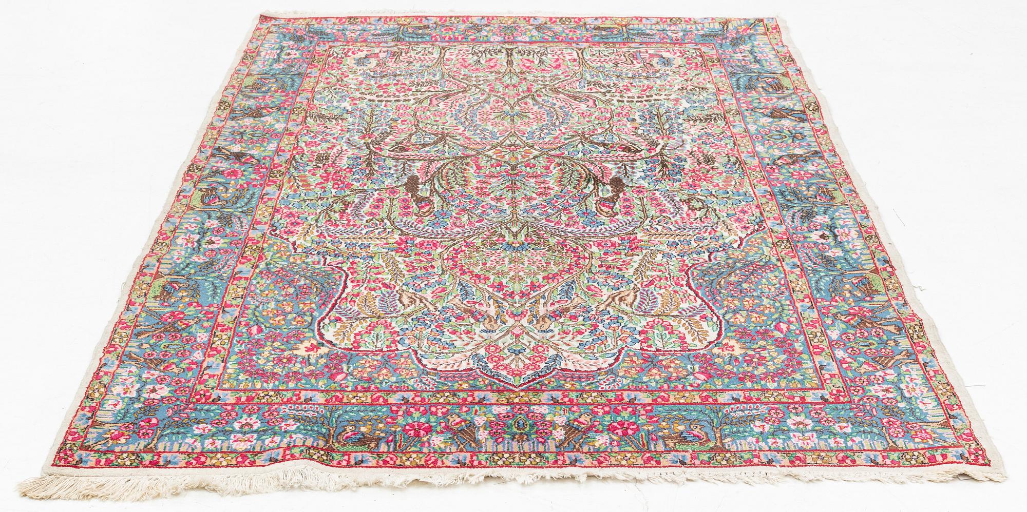 A semi-antique 'Millefleur' Kerman, ca ca 245 x 148 cm.
