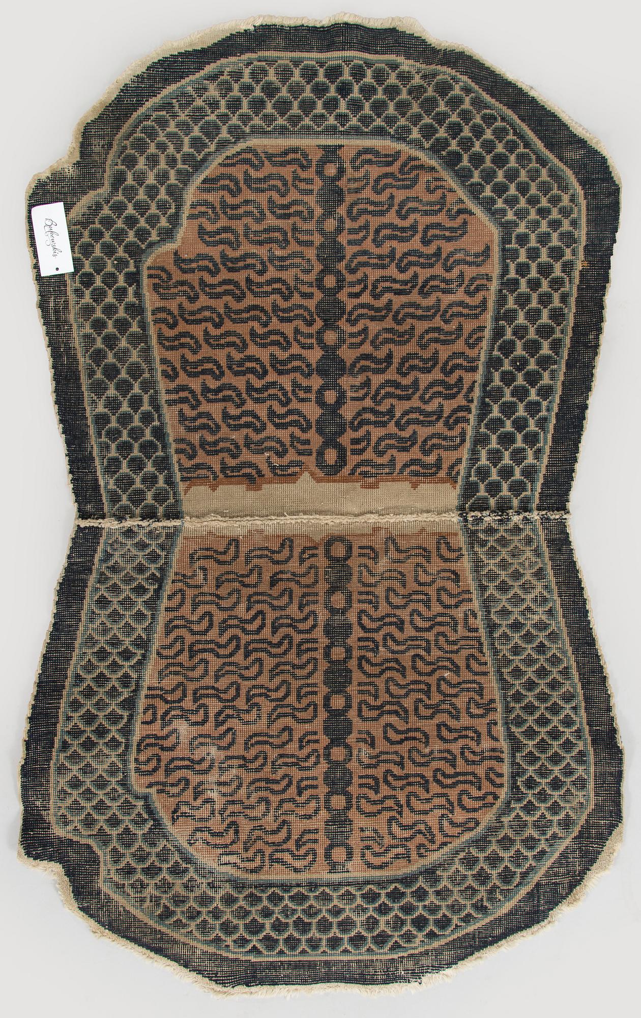 A 20th century tiger rug/saddle cloth, China.