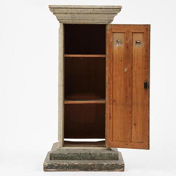 A Swedish column-shaped cabinet 19 th century.
