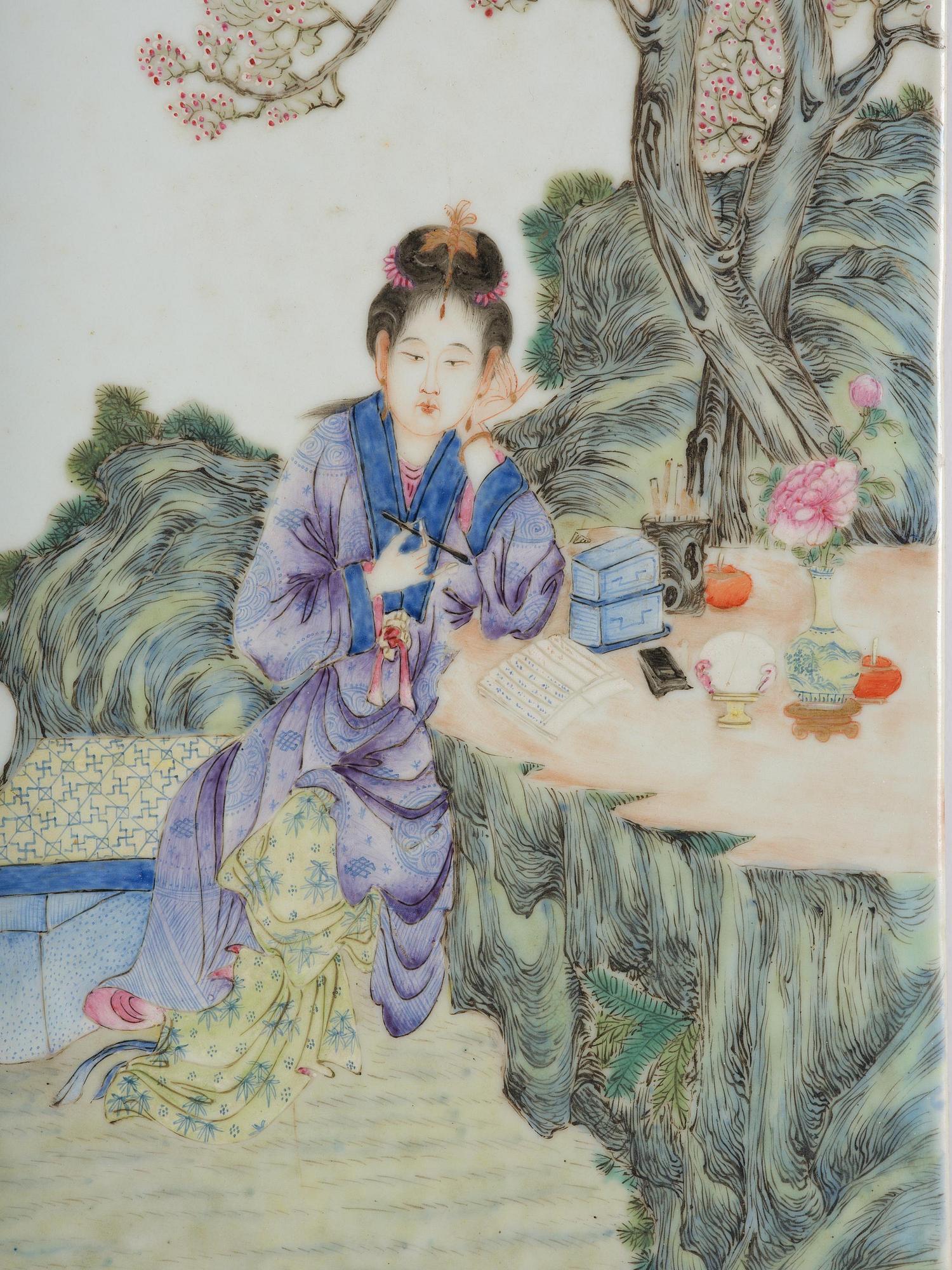 A set with four Chinese porcelain panels with a wooden frame, first half of 20th century.