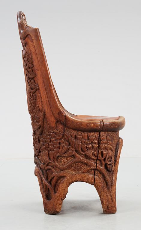 A Gustaf Fjaestad Art Nouveau sculptured pine chair, Sweden circa 1900.