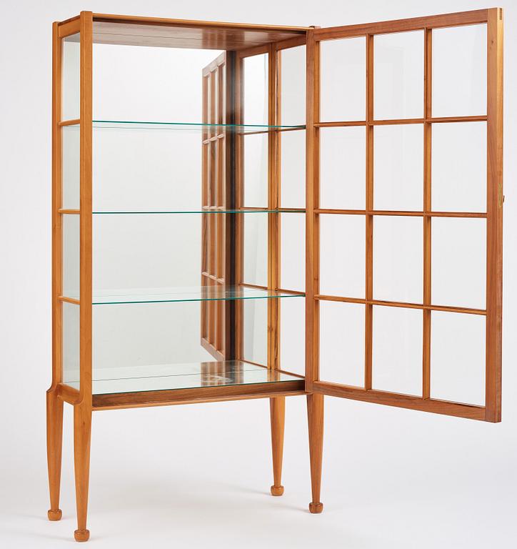 Josef Frank, a walnut showcase cabinet, Svenskt Tenn, Sweden, model B 2217, probably 1950s.