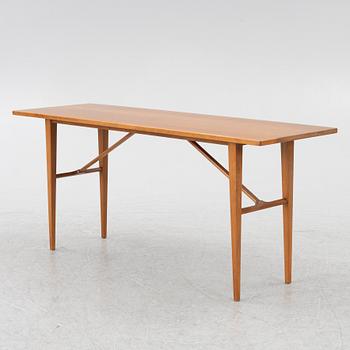 A coffee table/side table, Blomstermåla, circa the mid-20th century.