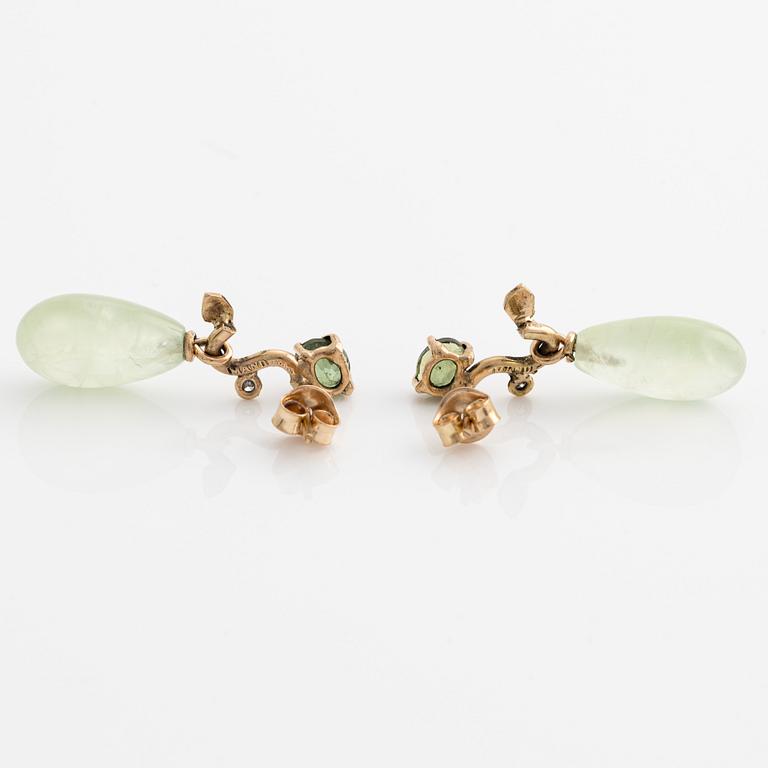 Earrings with prehnite, green tourmalines, and octagon-cut diamonds.