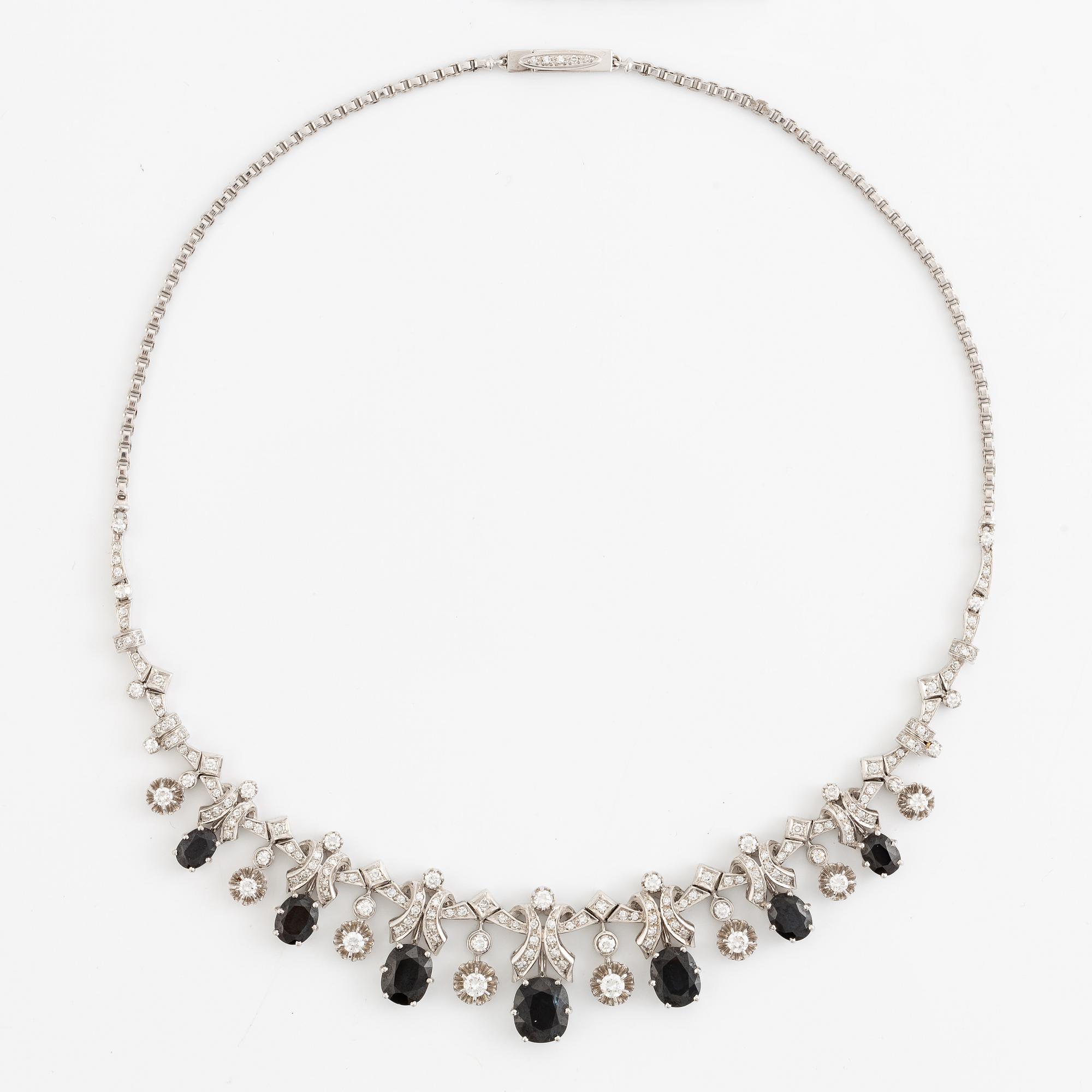 Necklace 18K white gold with step-cut sapphires and round and eight-cut diamonds.