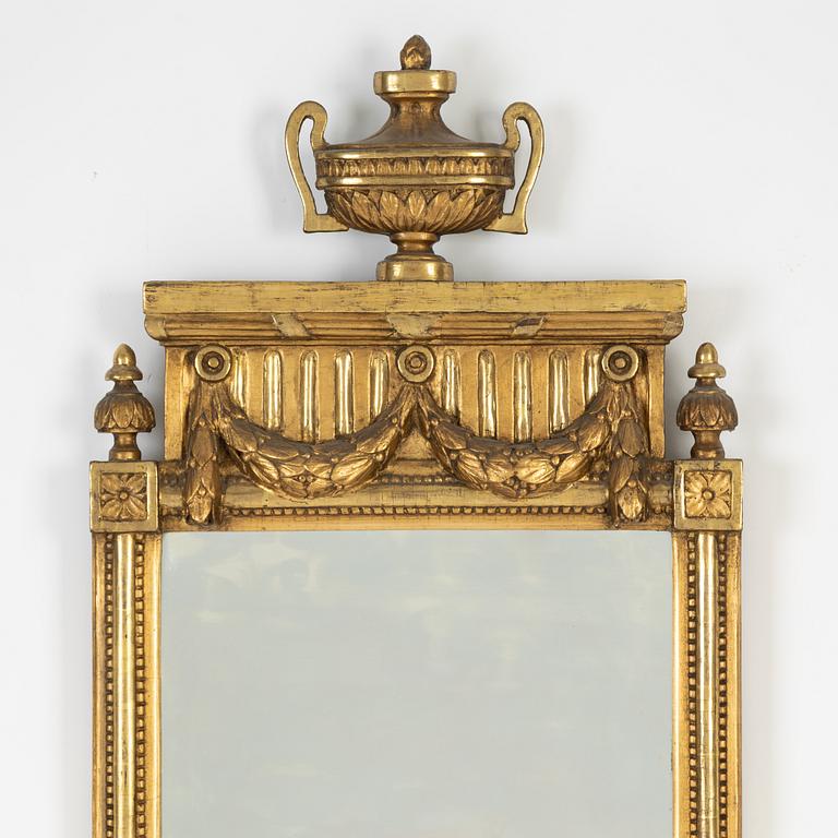 A Gustavian mirror, 1780s.