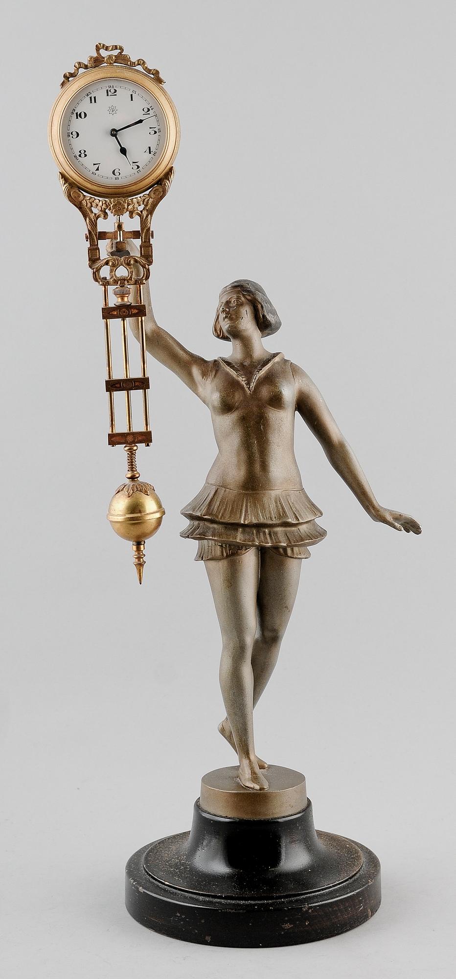 BORDSPENDYL, bronserad metall, 1900-talets första hälft.