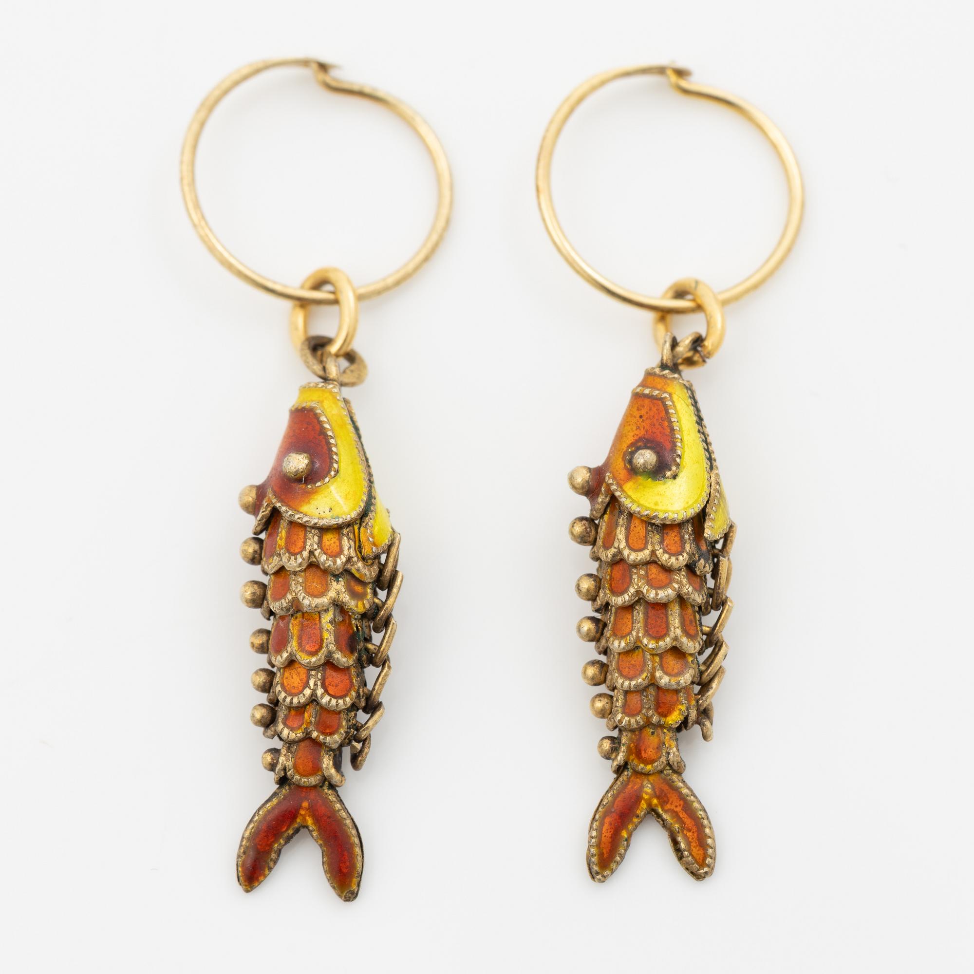 Silver earrings with enamel in the shape of fish.
