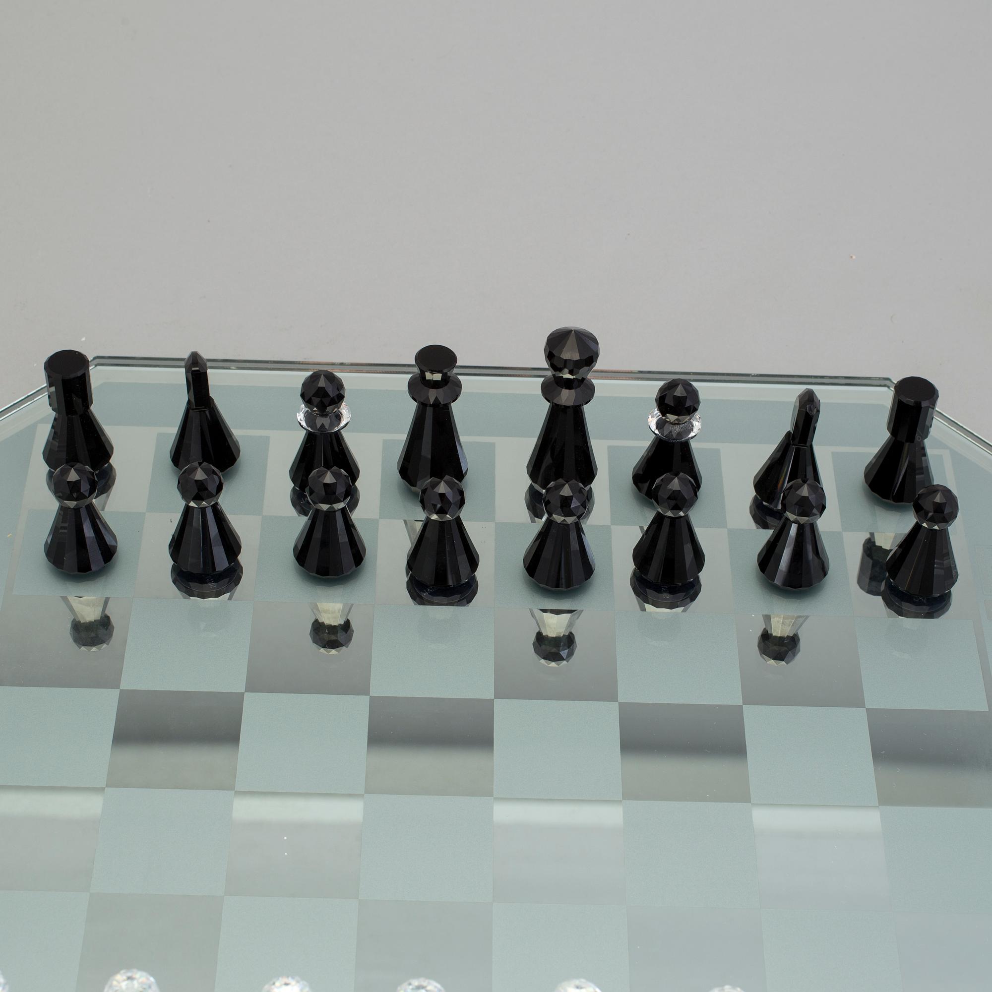 A SWAROVSKI CHESS SET.
