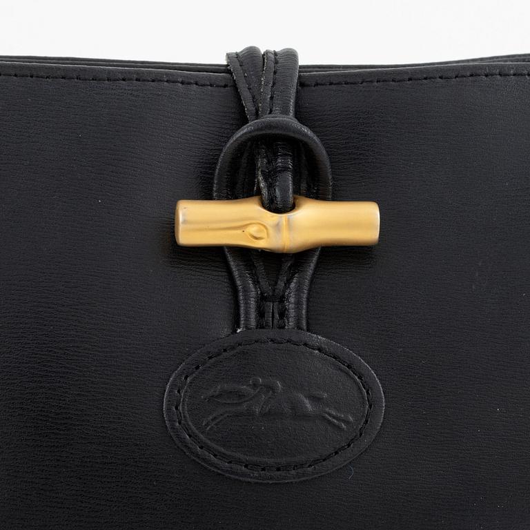 Longchamp, a leather bag.