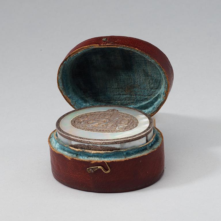 A French 18th century mother of pearl,tortoiseshell and silver snuff-box, marked Paris 1769.