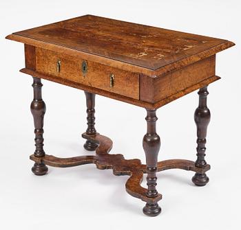 A Swedish late baroque burr-alder table, Stockholm, first part 18th century.