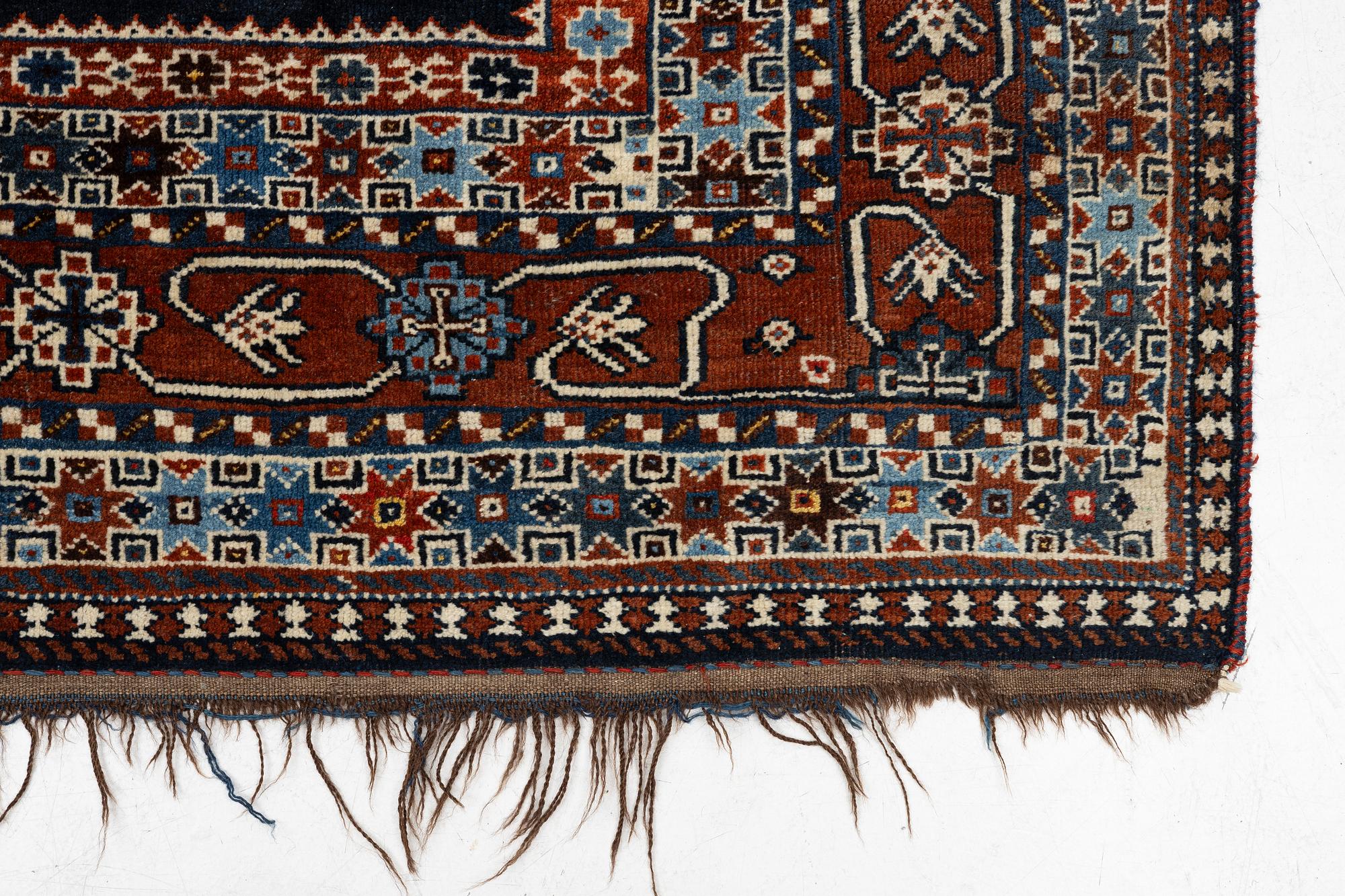 A carpet, Qashkai 'Shekarlou', approx. 310 x 227 cm.