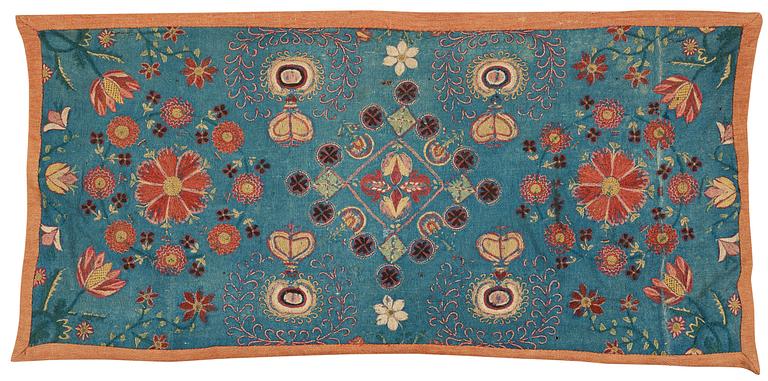 A CARRIAGE CUSHION, embroidered. "Blomsterdyna". 54 x 110 cm. Skåne (Scania, southern part of Sweden) around 1800.