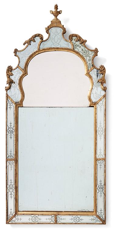 A Baroque gilt-lead and engraved glass mirror in the manner of Burchard Precht, early 18th century.
