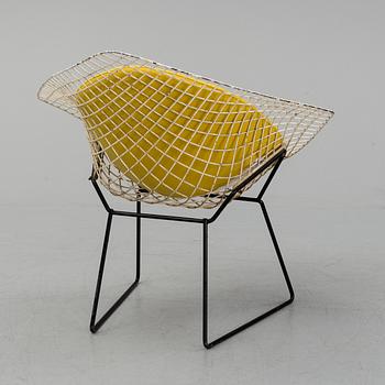 A 'Diamond chair' by Harry Bertoia, designed 1952.