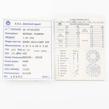 Ring 18K gold with a round brilliant-cut diamond.