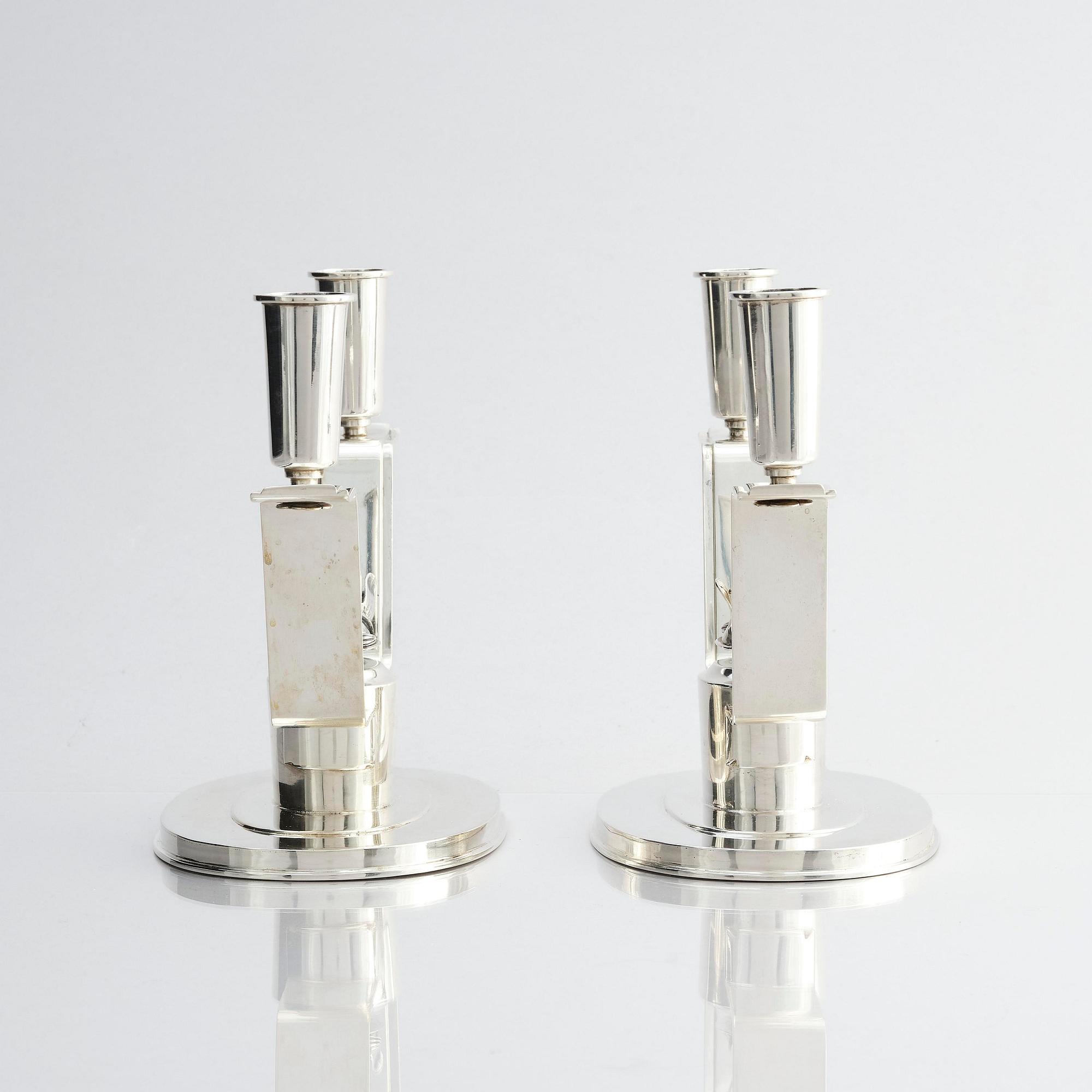 Carl Fredrik Carlman, a pair of silver candlesticks, design by Per Sköld, Stockholm, Sweden 1945.