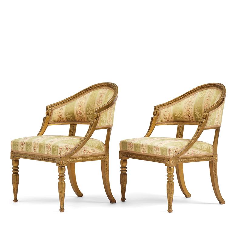 A pair of late Gustavian open armchairs attributed to E. Ståhl (master in Stockholm 1794-1820).
