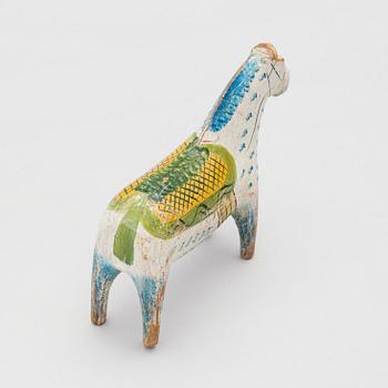 A painted folk art dala horse first half of the 20th century.