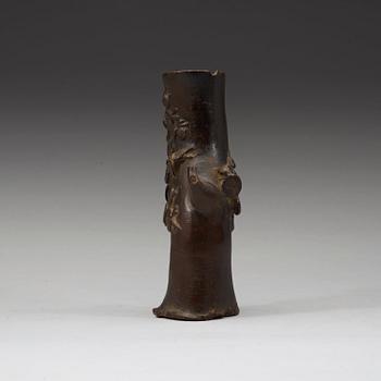 A bronze wood shaped vase, Ming dynasty (1368-1643).