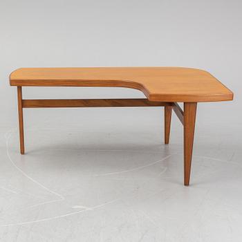 A teak vennered coffee table, 1960's.