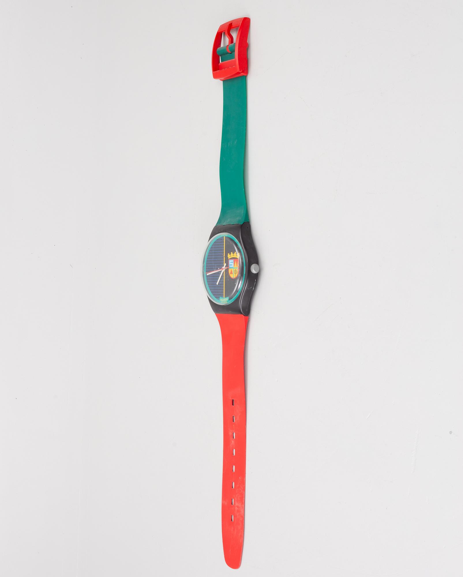 Wall clock, Swatch.