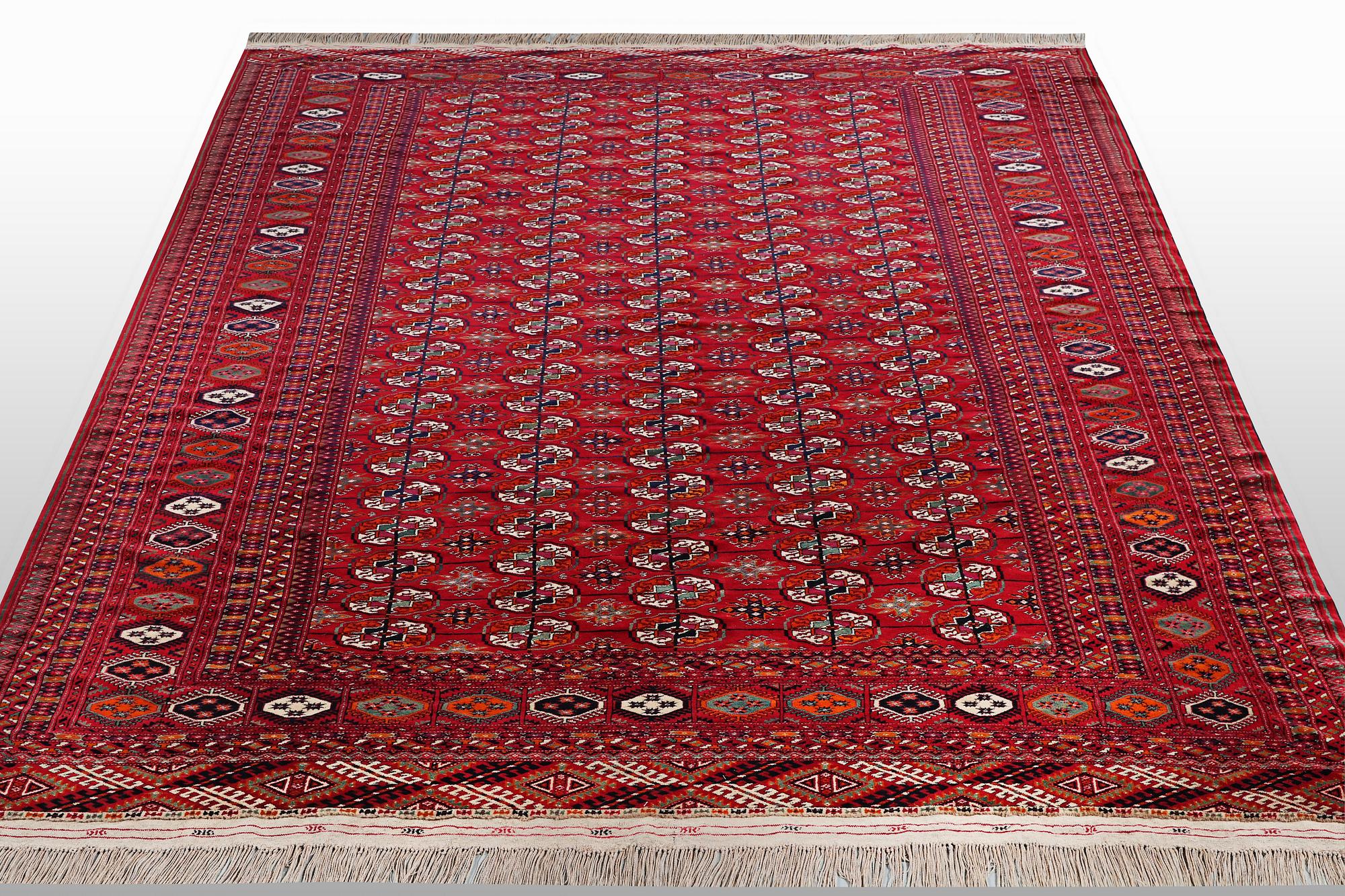 A carpet, semi-antique Tekke, ca 330 x 250 cm.
