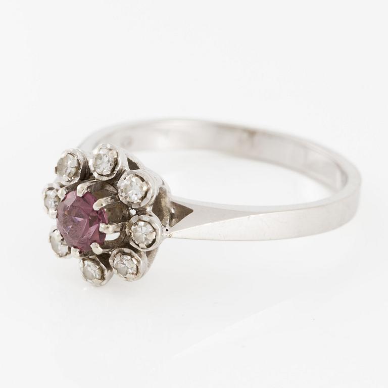Ring, cameo model, 18K white gold with small diamonds and red-toned stone,.
