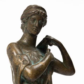 Antiquity-inspired woman.