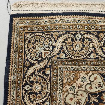 A silk Qum carpet, around  219 x 137 cm.