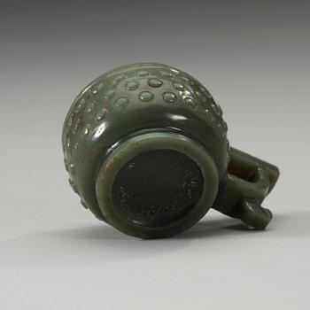 A Chinese archaistic carved nephrite cup.