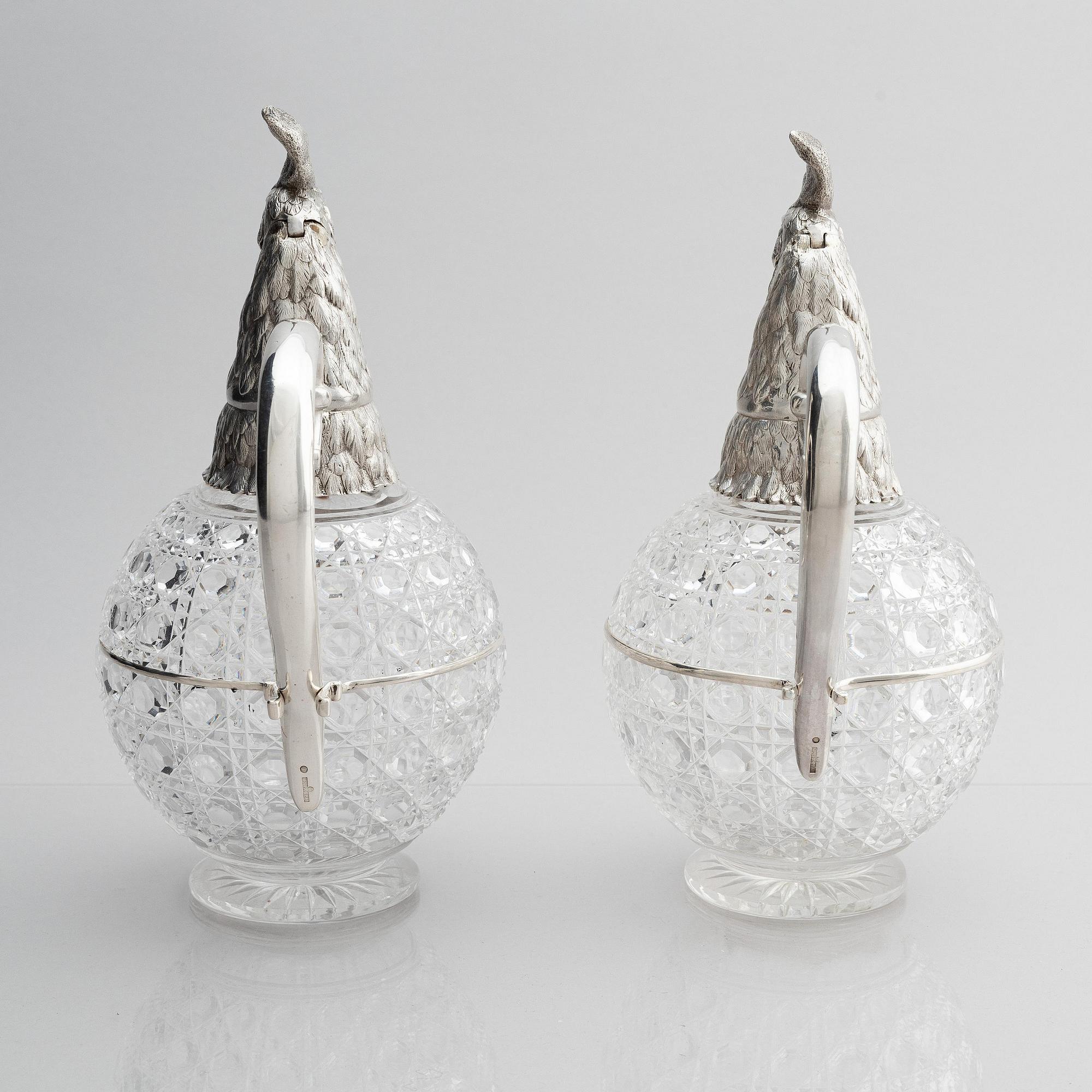 A pair of silver and cut-glass decanters, mark of Gratchev company, St. Petersburg 1908-1917.