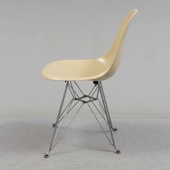 A 'DSR' chair and three loose seat  by Charles & Ray Eames for Vitra, 1960s/70s.