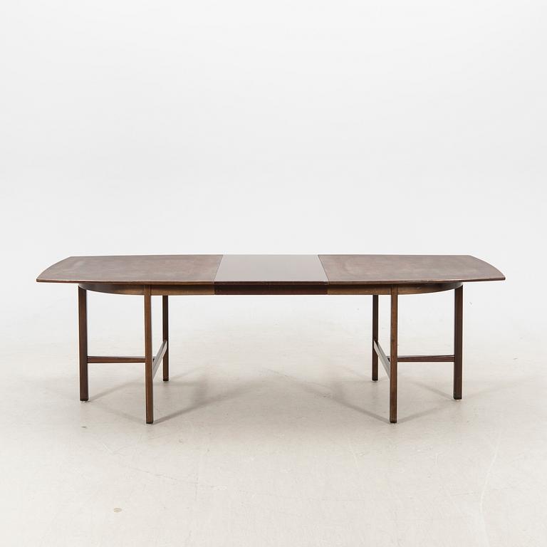 A table and four chairs in lacquered mahogany by David Rosén, "Triva-diné", middle of the 20th century.