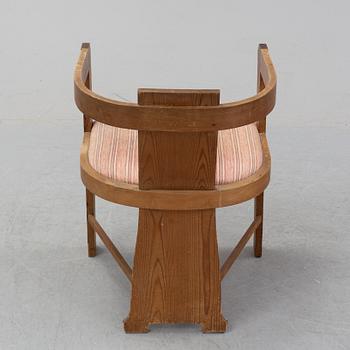 A pine armchair attributed to Carl Westman early 20th Century.