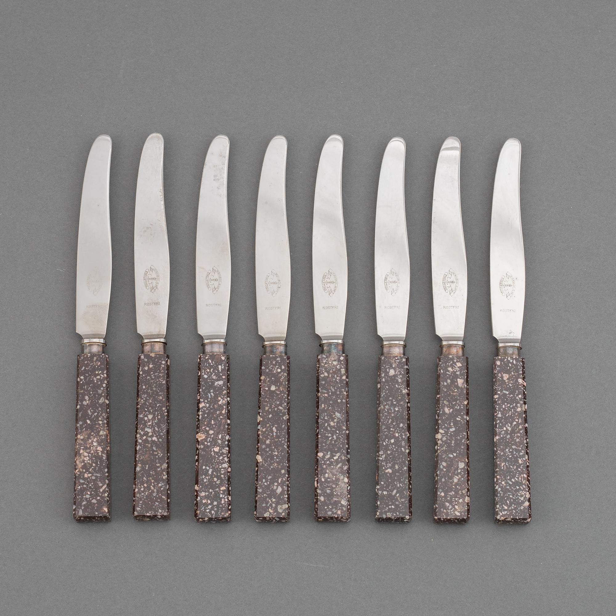 A set of eight porphyr knives, early 20th century.