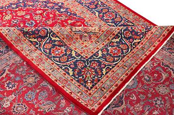 A Keshan carpet, c. 408 x 295 cm.