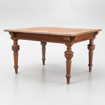 A dining table, late 19th Century.