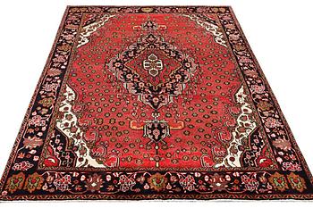 An Azerbaijan carpet, c. 306 x 208 cm.