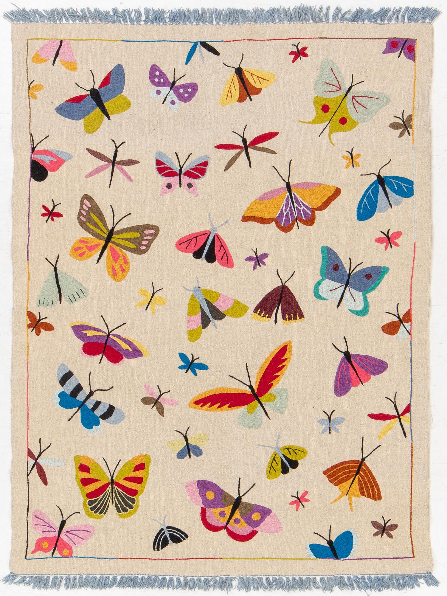 A hand-embroidered kilim carpet, c. 195 x 148 cm.