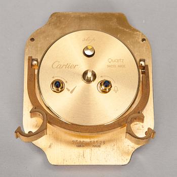 A CARTIER TABLE CLOCK, steel with gidt decoration, late 20th century.