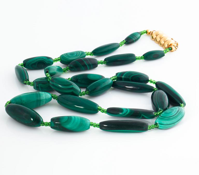 A malakite and green paste necklace.