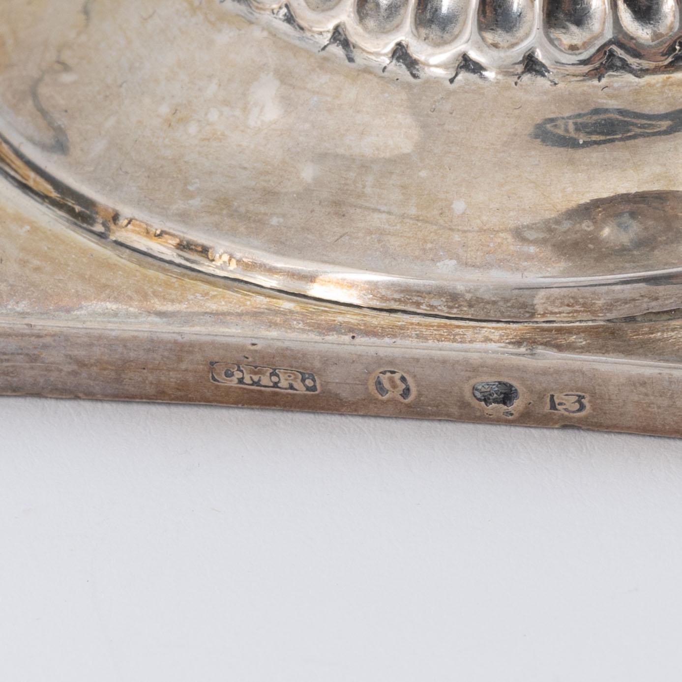 A pair of silver candle sticks by CM Ryberg Stockholm, 1815.