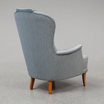 A second half of the 20th Century armchair by Carl Malmsten.